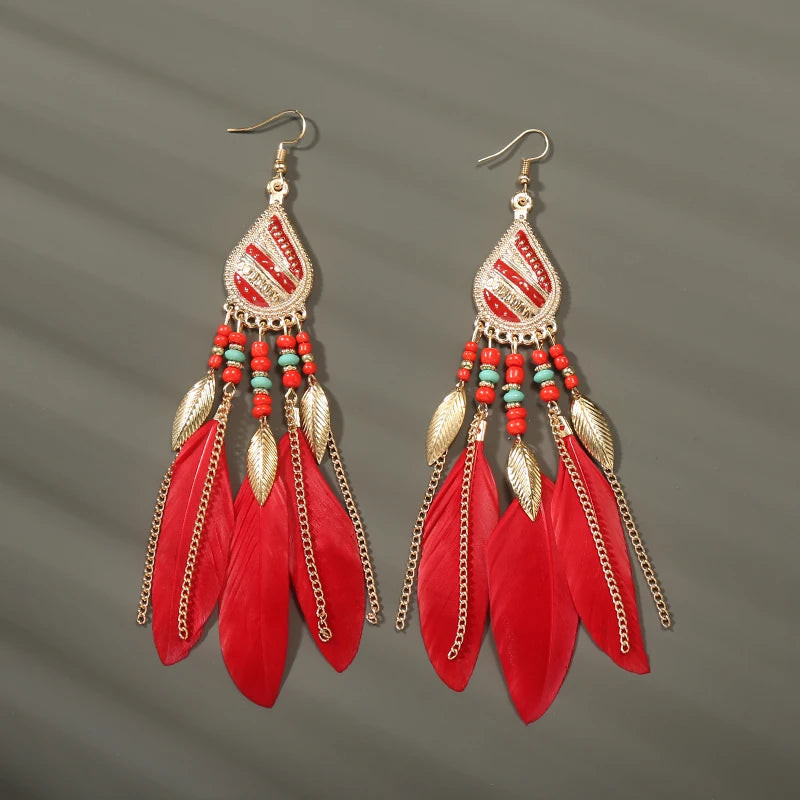 Aros Largos Boho con Pluma y Borlas