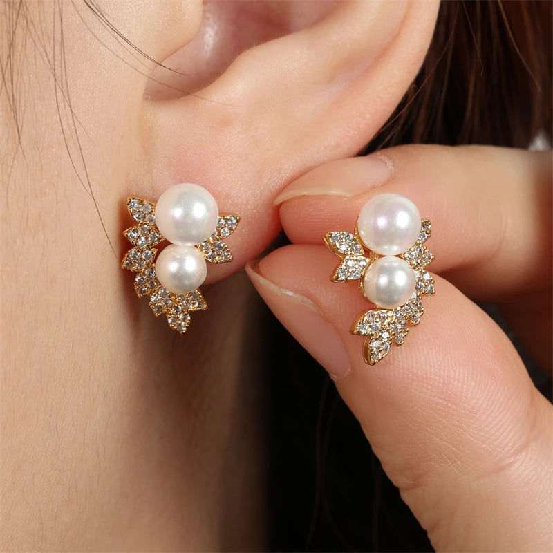 Aros Stud con Perla y Zirconia Forma de Hoja